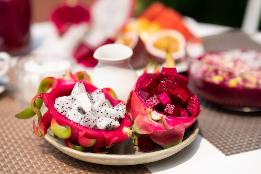 table arrangement with dragon fruit snacks outdoors