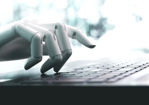 robot concept or robot hand chatbot pressing computer keyboard enter